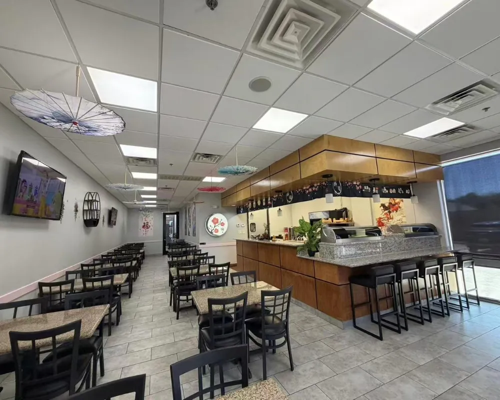 Restaurant interior showing dining seats and granite counter bar at Mei Garden Asian Cuisine, a Asian Restaurant in Sugar Land